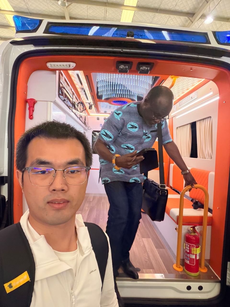On-site equipment evaluation during a buyer visit to an ambulance supplier in China.
